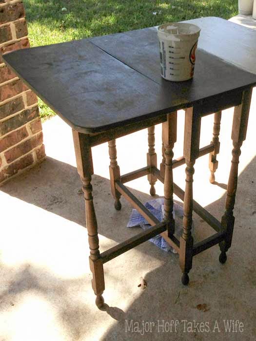 Gate leg table being painted