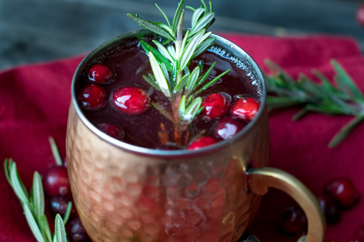 Cranberry Moscow Mule With Fresh Rosemary - SIp and Feast